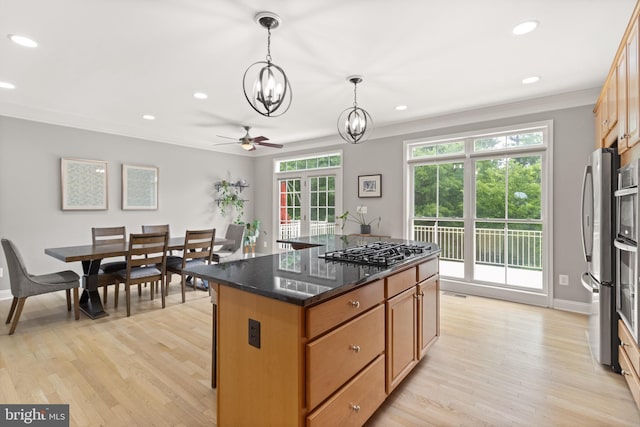 504 Hollingsworth Ter, Herndon, VA 20170 - kitchen with freestanding refrigerator, gas stovetop, light wood-style floors, recessed lighting, and a chandelier
