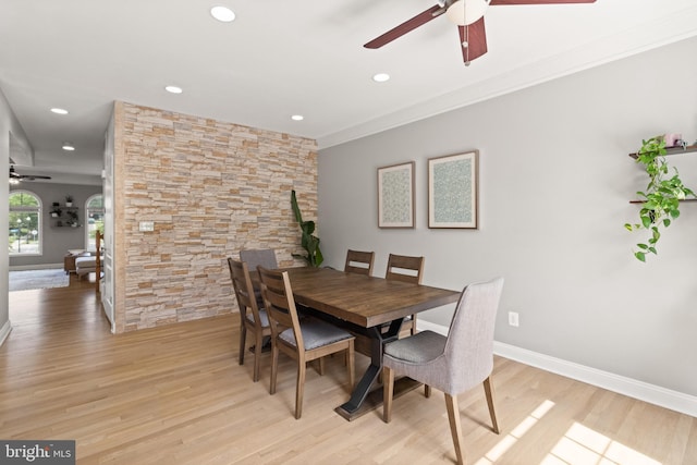 504 Hollingsworth Ter, Herndon, VA 20170 - dining room featuring a ceiling fan, light wood-style floors, recessed lighting, baseboards, and crown molding