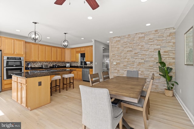 504 Hollingsworth Ter, Herndon, VA 20170 - dining area featuring recessed lighting, light wood finished floors, baseboards, and a ceiling fan