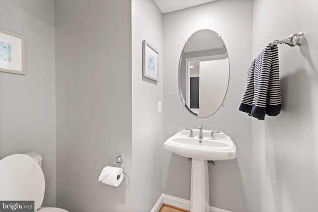 504 Hollingsworth Ter, Herndon, VA 20170 - half bathroom with toilet and baseboards