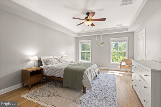 504 Hollingsworth Ter, Herndon, VA 20170 - bedroom with a raised ceiling, light wood-style floors, baseboards, and a ceiling fan