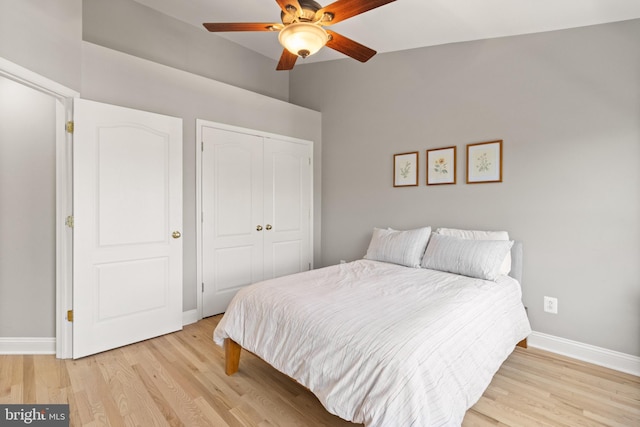 504 Hollingsworth Ter, Herndon, VA 20170 - bedroom with light wood finished floors, a closet, baseboards, vaulted ceiling, and ceiling fan