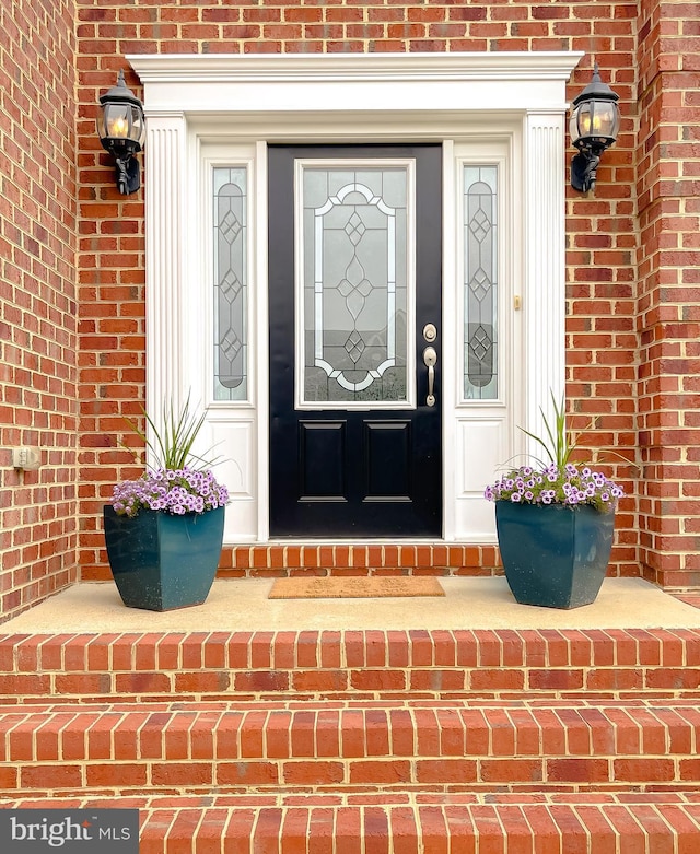 24655 Broad Creek Dr, Hollywood, MD 20636 - doorway to property with brick siding