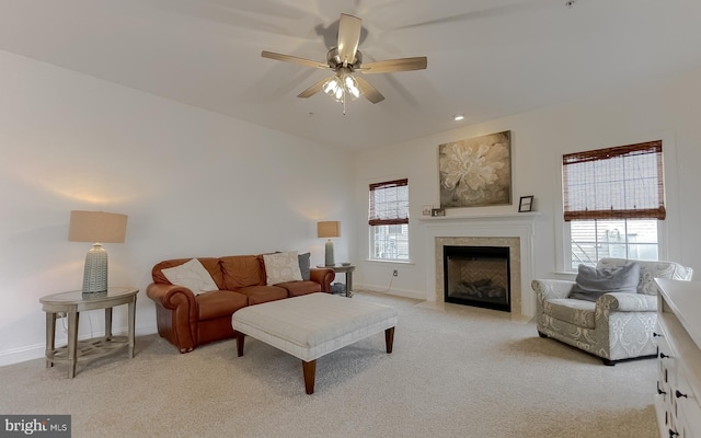 24655 Broad Creek Dr, Hollywood, MD 20636 - living room featuring light carpet, ceiling fan, baseboards, and a tiled fireplace