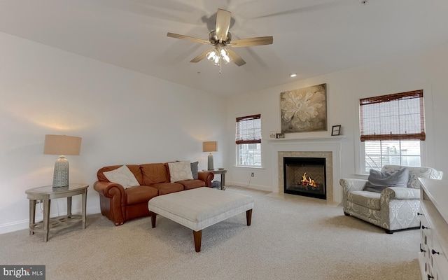 24655 Broad Creek Dr, Hollywood, MD 20636 - living area featuring light carpet, a ceiling fan, baseboards, and a fireplace with flush hearth