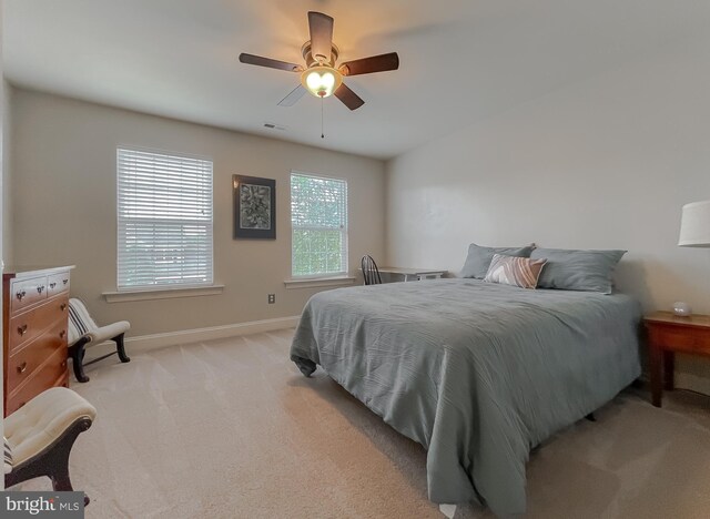 24655 Broad Creek Dr, Hollywood, MD 20636 - bedroom with light carpet, baseboards, and a ceiling fan