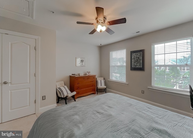 24655 Broad Creek Dr, Hollywood, MD 20636 - bedroom with attic access, baseboards, light carpet, and ceiling fan