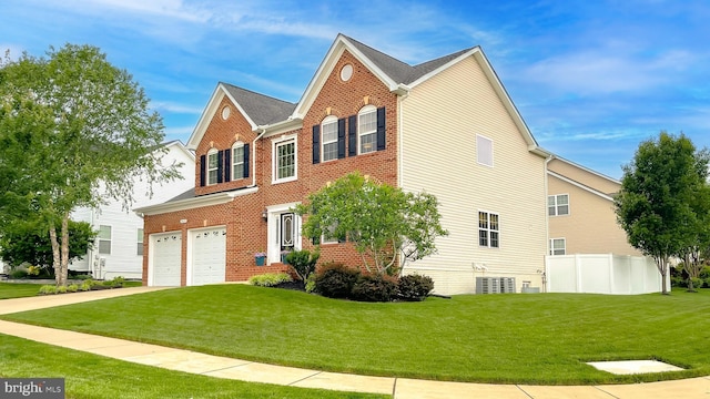24655 Broad Creek Dr, Hollywood, MD 20636 - view of front facade featuring brick siding, a garage, and driveway