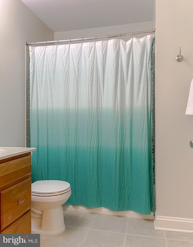24655 Broad Creek Dr, Hollywood, MD 20636 - full bath with tile patterned floors, toilet, vanity, and a shower with shower curtain