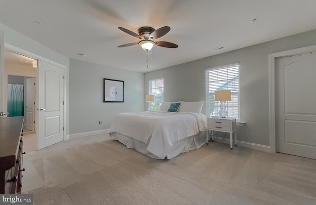 24655 Broad Creek Dr, Hollywood, MD 20636 - bedroom featuring light carpet, baseboards, and ceiling fan
