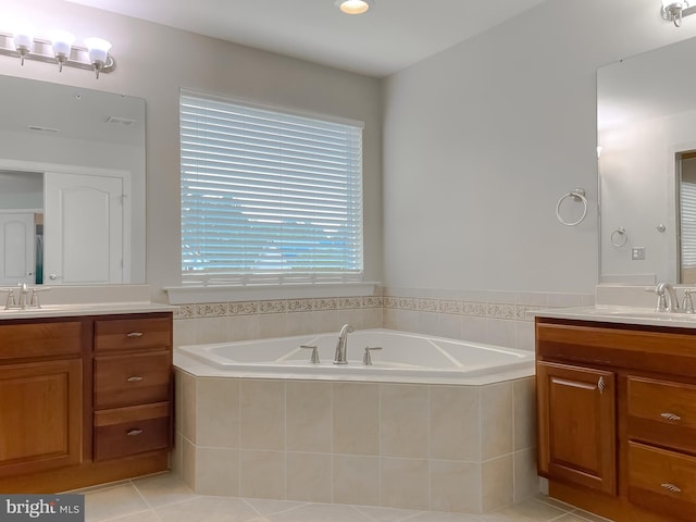 24655 Broad Creek Dr, Hollywood, MD 20636 - full bath with two vanities, a garden tub, and tile patterned floors