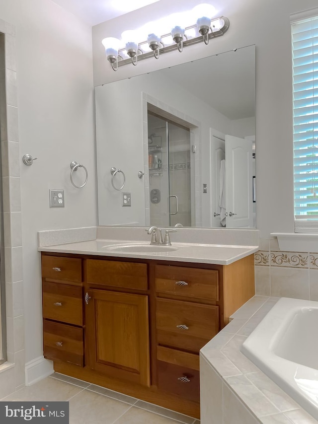 24655 Broad Creek Dr, Hollywood, MD 20636 - full bath featuring a bath, vanity, a stall shower, and tile patterned floors