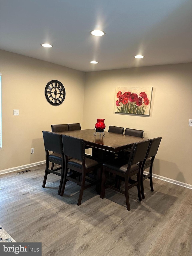 1088 Locust Dr, Pasadena, MD 21122 - dining space featuring wood finished floors, baseboards, and recessed lighting