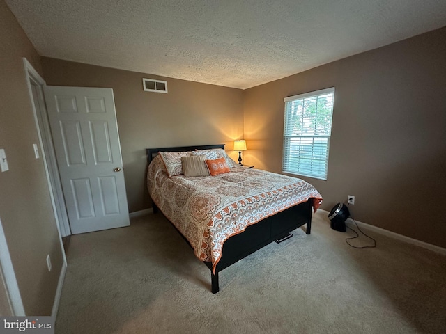 1088 Locust Dr, Pasadena, MD 21122 - bedroom with carpet, a textured ceiling, and baseboards