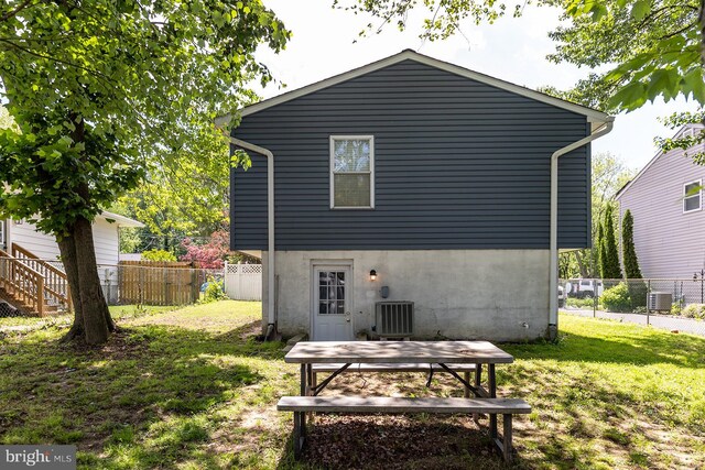 1088 Locust Dr, Pasadena, MD 21122 - rear view of property featuring cooling unit