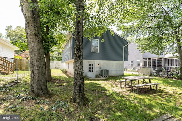 1088 Locust Dr, Pasadena, MD 21122 - back of property with central AC and a sunroom