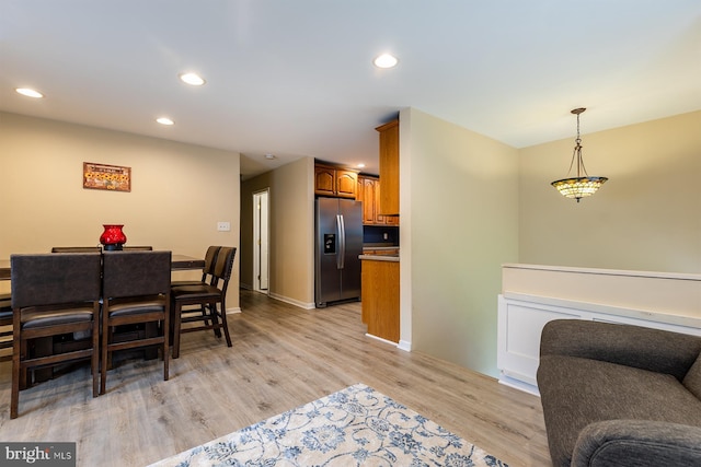 1088 Locust Dr, Pasadena, MD 21122 - dining space with light wood finished floors, recessed lighting, and baseboards