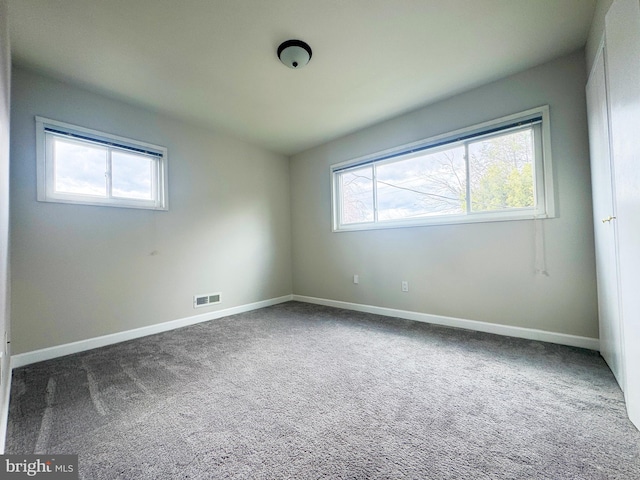 920 Vanderwood, Baltimore, MD 21228 - empty room with dark colored carpet and baseboards