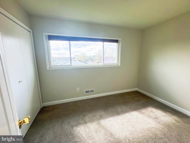 920 Vanderwood, Baltimore, MD 21228 - unfurnished bedroom featuring carpet, baseboards, and a closet