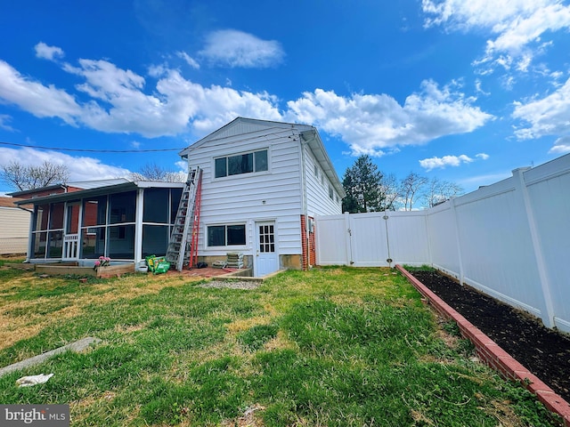 920 Vanderwood, Baltimore, MD 21228 - back of property with a gate and a sunroom