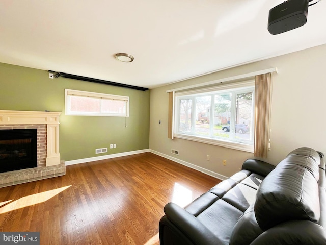 920 Vanderwood, Baltimore, MD 21228 - living area with wood finished floors, plenty of natural light, and baseboards