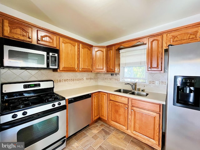 920 Vanderwood, Baltimore, MD 21228 - kitchen featuring stainless steel appliances, a sink, light countertops, and backsplash