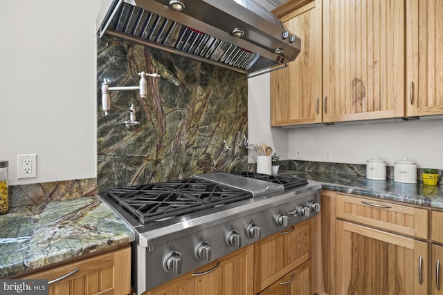 1109 Cherry Point Rd, West River, MD 20778 - kitchen featuring extractor fan, stainless steel gas cooktop, decorative backsplash, and dark stone counters