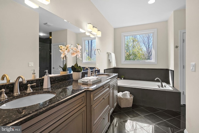 1109 Cherry Point Rd, West River, MD 20778 - full bath featuring tile patterned flooring, double vanity, and a bath