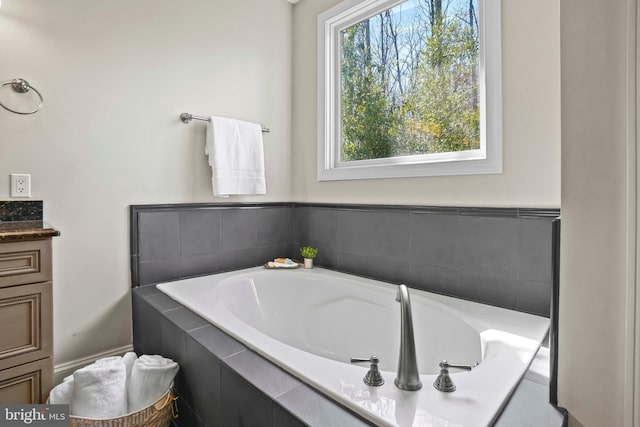 1109 Cherry Point Rd, West River, MD 20778 - full bathroom with a garden tub and vanity