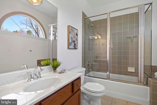 1109 Cherry Point Rd, West River, MD 20778 - bathroom with vanity, toilet, bath / shower combo with glass door, and tile patterned flooring