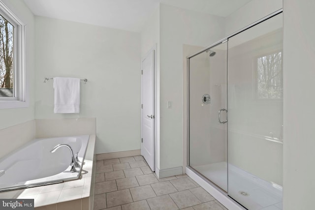 1109 Cherry Point Rd, West River, MD 20778 - bathroom with a stall shower, a bath, tile patterned flooring, and baseboards