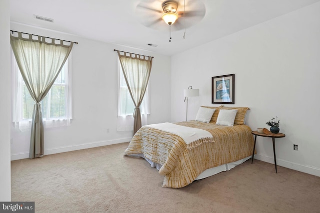 1109 Cherry Point Rd, West River, MD 20778 - bedroom with carpet, baseboards, and a ceiling fan