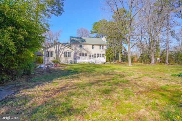 1109 Cherry Point Rd, West River, MD 20778 - back of property with a chimney and a yard