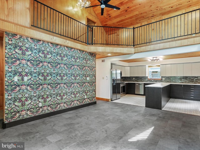 44 Wild Rose Ct, Hedgesville, WV 25427 - kitchen with stainless steel appliances, high vaulted ceiling, backsplash, a ceiling fan, and a sink