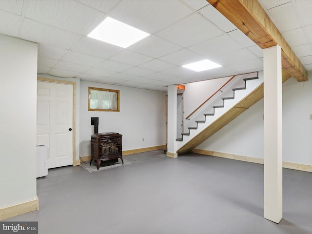44 Wild Rose Ct, Hedgesville, WV 25427 - finished below grade area with baseboards, a wood stove, stairway, and a drop ceiling