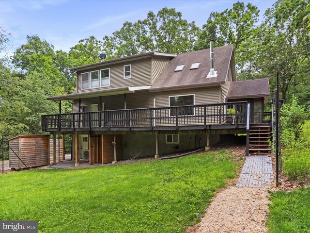 44 Wild Rose Ct, Hedgesville, WV 25427 - back of property featuring a deck, stairs, a yard, and a shingled roof