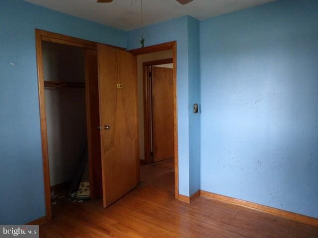 179 Mount Pleasant St, Frostburg, MD 21532 - unfurnished bedroom with light wood-style flooring, a closet, and baseboards