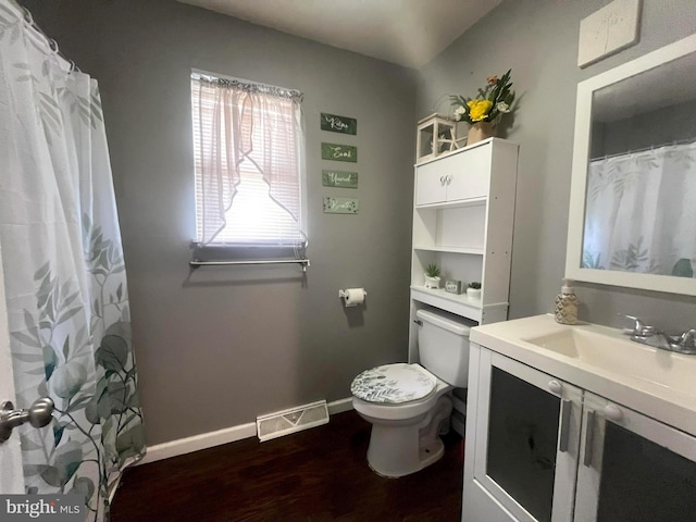 127 Greenwich Ave, Paulsboro, NJ 08066 - full bathroom featuring toilet, wood finished floors, vanity, baseboards, and curtained shower