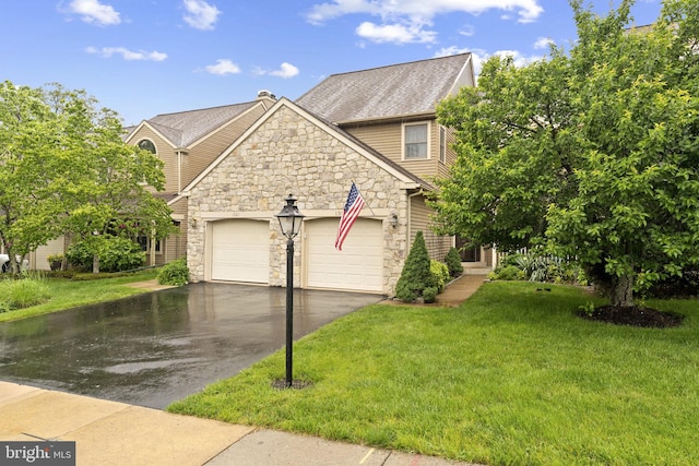 1319 Gwynedale Way, Lansdale, PA 19446 - view of front of property featuring stone siding, asphalt driveway, a garage, and a front lawn