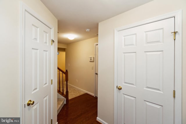 1254 Corbett Pl, Woodbridge, VA 22191 - hall with dark wood-type flooring and baseboards