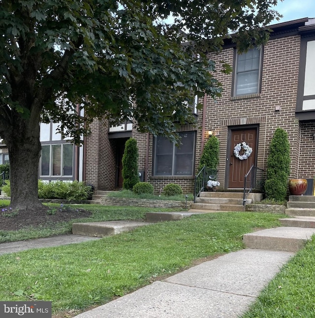 23 Faraday Dr, Lutherville Timonium, MD 21093 - view of front of home with brick siding and a front yard