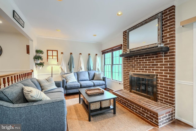23 Faraday Dr, Lutherville Timonium, MD 21093 - living room with wood finished floors, a brick fireplace, recessed lighting, baseboards, and ornamental molding