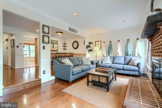 23 Faraday Dr, Lutherville Timonium, MD 21093 - living area featuring wood finished floors, ornamental molding, recessed lighting, and baseboards