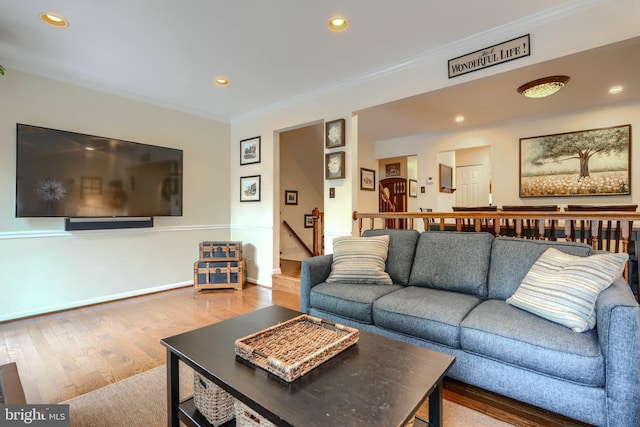 23 Faraday Dr, Lutherville Timonium, MD 21093 - living area with crown molding, wood finished floors, and recessed lighting