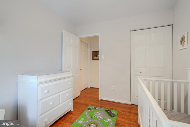 23 Faraday Dr, Lutherville Timonium, MD 21093 - bedroom with light wood-style floors and a closet