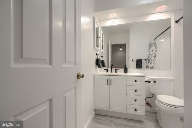 23 Faraday Dr, Lutherville Timonium, MD 21093 - full bathroom with vanity, toilet, a shower with curtain, and baseboards
