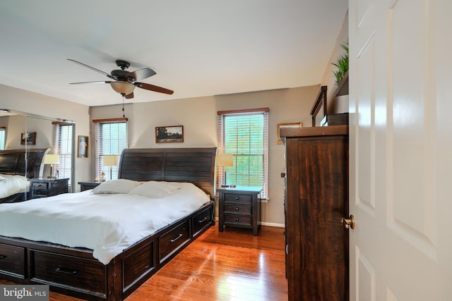 23 Faraday Dr, Lutherville Timonium, MD 21093 - bedroom featuring multiple windows, hardwood / wood-style floors, baseboards, and ceiling fan
