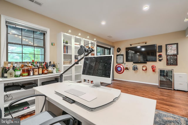23 Faraday Dr, Lutherville Timonium, MD 21093 - office area featuring beverage cooler, wood finished floors, a dry bar, recessed lighting, and baseboards