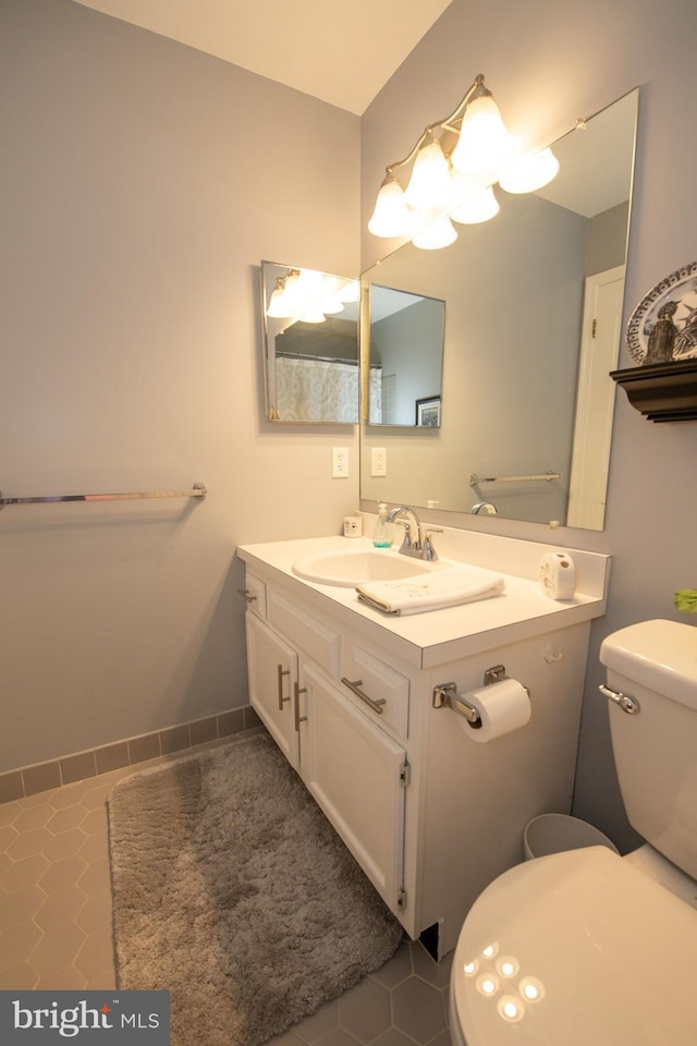 604 Remington Ct, Chalfont, PA 18914 - bathroom featuring vanity, toilet, baseboards, tile patterned floors, and a chandelier