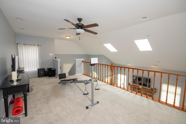 604 Remington Ct, Chalfont, PA 18914 - workout room with ceiling fan, vaulted ceiling, carpet floors, and a skylight